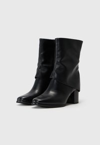 Marco Tozzi Bottines compensées - black