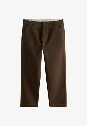 Prune puuvillased püksid, millel on lame esiosa, küljetaskud ja sile tekstuur. Vöös on nupuga kinnis.