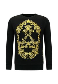 Zwarte sweater met een grote, gedetailleerde gele schedelafbeelding met bloemmotieven en verfijnd lijnwerk. Ronde halslijn en lange mouwen.