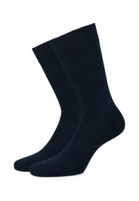 Granatowe skarpetki wykonane z gładkiego, miękkiego materiału. Posiadają prążkowany ściągacz u góry oraz bezszwowy design palców.