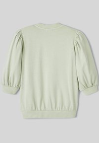 Pull vert clair avec des manches bouffantes, des poignets et un ourlet côtelés. Tissu doux avec une texture lisse, doté d'un col arrondi.