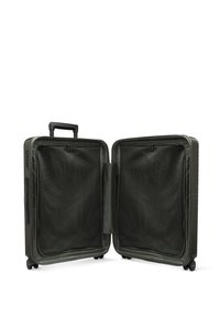 Valise rigide de couleur vert foncé avec une finition texturée. L'intérieur comprend des compartiments en filet zippés. Elle est dotée d'une poignée rétractable et de roues.