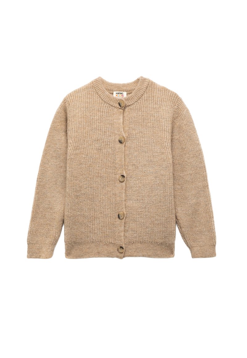 Beige neulepusero, jossa on pyöreä kaula-aukko, etuvetoketju ja pitkät hihat. Ominaisuuksina tekstuuri ja rento malli.