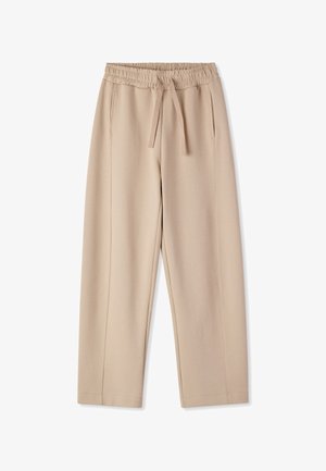 Pantaloni beige a gamba larga realizzati in tessuto morbido, con un elastico in vita dotato di cordoncino, due tasche laterali e dettagli delle cuciture ricamate.