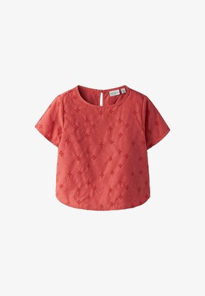 Haut corail à manches courtes avec col rond, agrémenté d'une broderie florale, d'un dos en forme de clé et d'une finition texturée. Design décontracté.