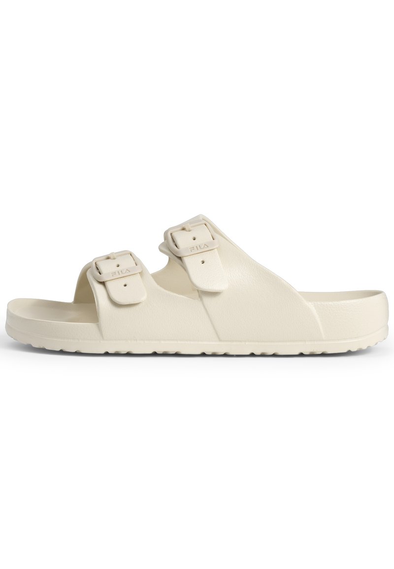 Sandales beige avec deux sangles réglables et boucles, un large pied de page et une semelle texturée pour une meilleure adhérence. Fabriquées en matériau synthétique.