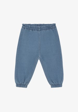 Blaue Jeanshose mit elastischem Bund, zulaufenden Beinen und gerafften Bündchen. Glatte Textur, gerade Nähte und keine sichtbaren Taschen.
