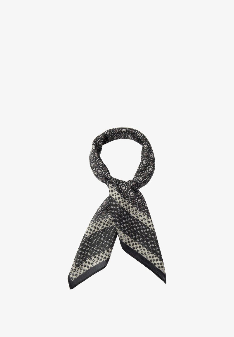 Sort og creme mønstret tørklæde med geometriske designs, der har en blød tekstur og en draperet form. Accentueret med en kontrasterende kant.