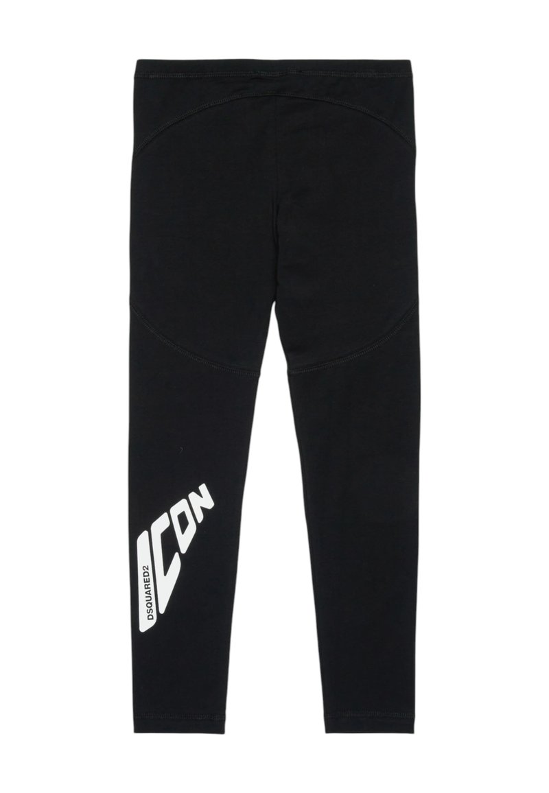 Leggings noirs en tissu extensible, avec un imprimé graphique blanc sur la jambe gauche et un design sans couture à la taille et aux jambes.