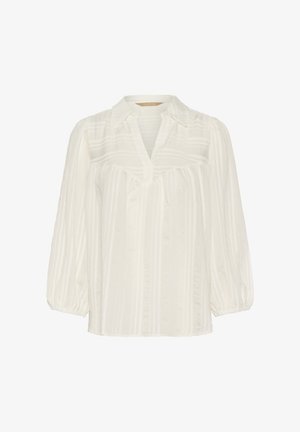 Gaišs viegls blūze ar mīkstu tekstūru, vertikālām svītrām, norādītu apkakli un plūstošām bumbas piedurknēm. Iekļauj V veida kakla atvērumu.