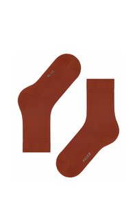 Rostrote Baumwollsocken im Crew-Stil mit glatter Textur, ausgestattet mit einem gerippten Bündchen und dezentem Branding auf der Sohle.