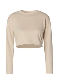Gekürztes Langarmshirt in einem hellbeigen Farbton, aus einem weichen Stoff mit einer glatten Textur und einem einfachen Rundhalsausschnitt.