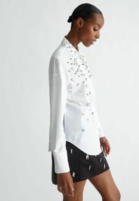 LIU JO WITH RHINESTONES - Bluza s gumbima - white