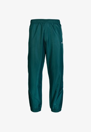 Lichtgewicht teal kleurige trainingsbroek met een elastische tailleband en boorden, met een gladde textuur en een klein logo aan de zijkant.