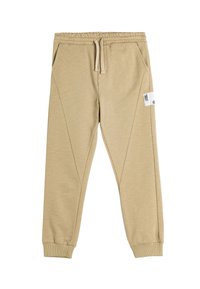 Beige joggingbroek van een katoenmix, met een elastische tailleband, zijzakken, taps toelopende pijpen en een vierkant label op de linker bovenbeen.