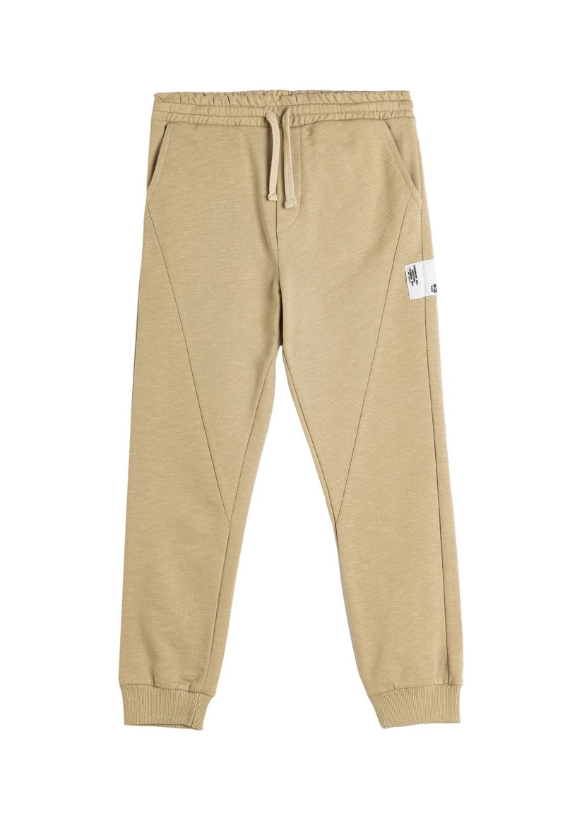 Beige joggingbroek van een katoenmix, met een elastische tailleband, zijzakken, taps toelopende pijpen en een vierkant label op de linker bovenbeen.