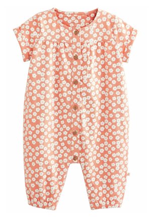 Ferskenfarvet blomsterdragt med korte ærmer, hvidt blomsterprint, træknapper foran, elastiske bundkanter og blødt bomuldsstof.