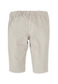 Pantalones cortos de cuadros beige con cintura elástica, fabricados con un tejido ligero y un diseño hasta la rodilla. No se ven bolsillos.