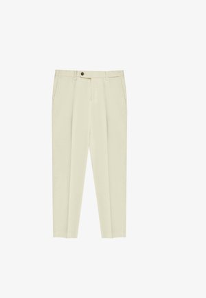 Lichtbeige broek van katoen, met een knoopsluiting, zijzakken, rechte pijpen en een gladde textuur.
