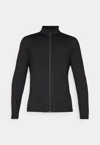 Veste zippée noire à manches longues avec un col haut, présentant un design ajusté, des coutures contrastées et des poches latérales pour des accents fonctionnels.