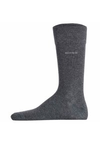 Graue Baumwollsocke mit geripptem Bündchen und glatter Textur. Mit dezentem Logo Detail an der Seite. Klassisches Design, das für verschiedene Anlässe geeignet ist.
