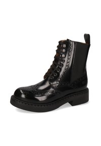 Stivaletti alla caviglia in pelle nera con una finitura lucida, dettagli brogue, design con lacci e suola in gomma testurizzata per una buona aderenza.