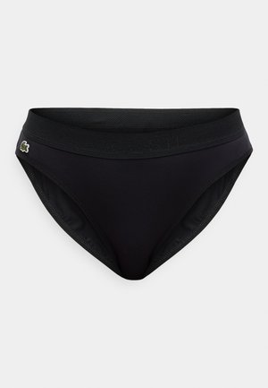 Zwarte bikinibroekjes met een getextureerde elastische tailleband en een klein geborduurd logo. Gemaakt van glad, rekbaar materiaal met een klassieke snit.