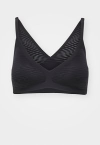 Soutien-gorge sans fil noir avec un décolleté en V, texture côtelée sur la partie supérieure et tissu lisse pour un ajustement confortable.