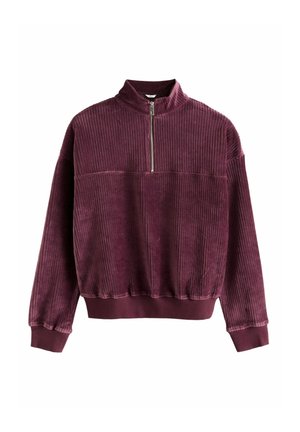 Burgundy corduroy pullover with a high neck, half-zip closure, ribbed texture, and elasticated cuffs and hem.