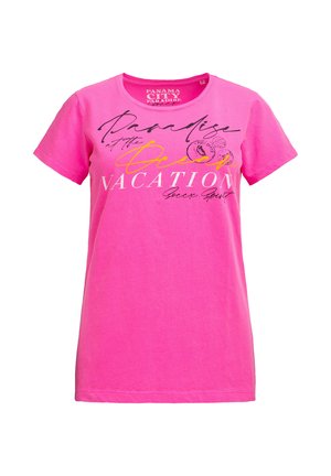 Bright pink short-sleeve T-shirt with black, yellow, and white text reading "Paradise at the Ocean Vacation" and postal stamp graphics.