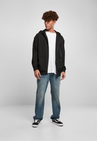 Urban Classics Jaka ar rāvējslēdzēju - black