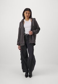 adidas Originals Široke nogavice - black