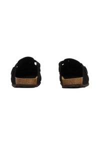Sorte ruskinds-sandaler med korksål, åben bag og udskæringsdesign. Har dobbeltstropper med en enkelt spænde på hver side.