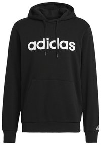 Felpa nera in misto cotone, con grande logo bianco "adidas", cappuccio con coulisse e tasca frontale. Polsi e orlo a coste.