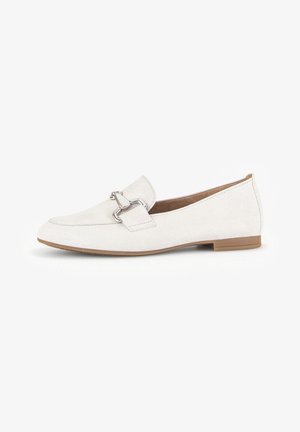 White suede loafers with a flat heel, featuring a metallic accent on the strap and a smooth finish. Simple, streamlined design.