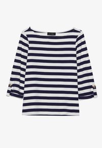 Marinblå och vit randig långärmad topp med båtutskuren hals och guldknappdetaljer på uppvikta ärmar. Mjuk tyg, avslappnad passform.