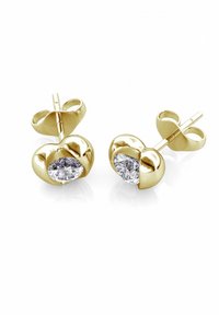 Orecchini a perno in oro con design a forma di cuore, caratterizzati da una pietra preziosa trasparente e sfaccettata al centro, texture liscia e finitura lucida.