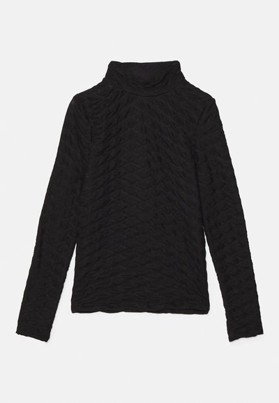 Black long-sleeve turtleneck with a textured wave pattern, featuring a relaxed fit and smooth fabric. No visible hardware or accents.