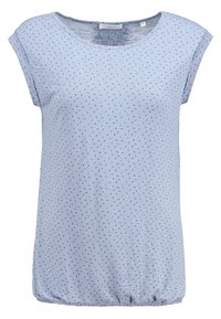 Ljusblå kortärmad topp i mjukt tyg, med ett subtilt heltäckande triangulärt mönster, och med drapperad detalj vid fållen.