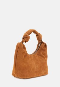 Suède handtas in roestkleur met een geknoopte handgreep en een ritssluiting. Zachte textuur, gestructureerde vorm en ronde silhouet.