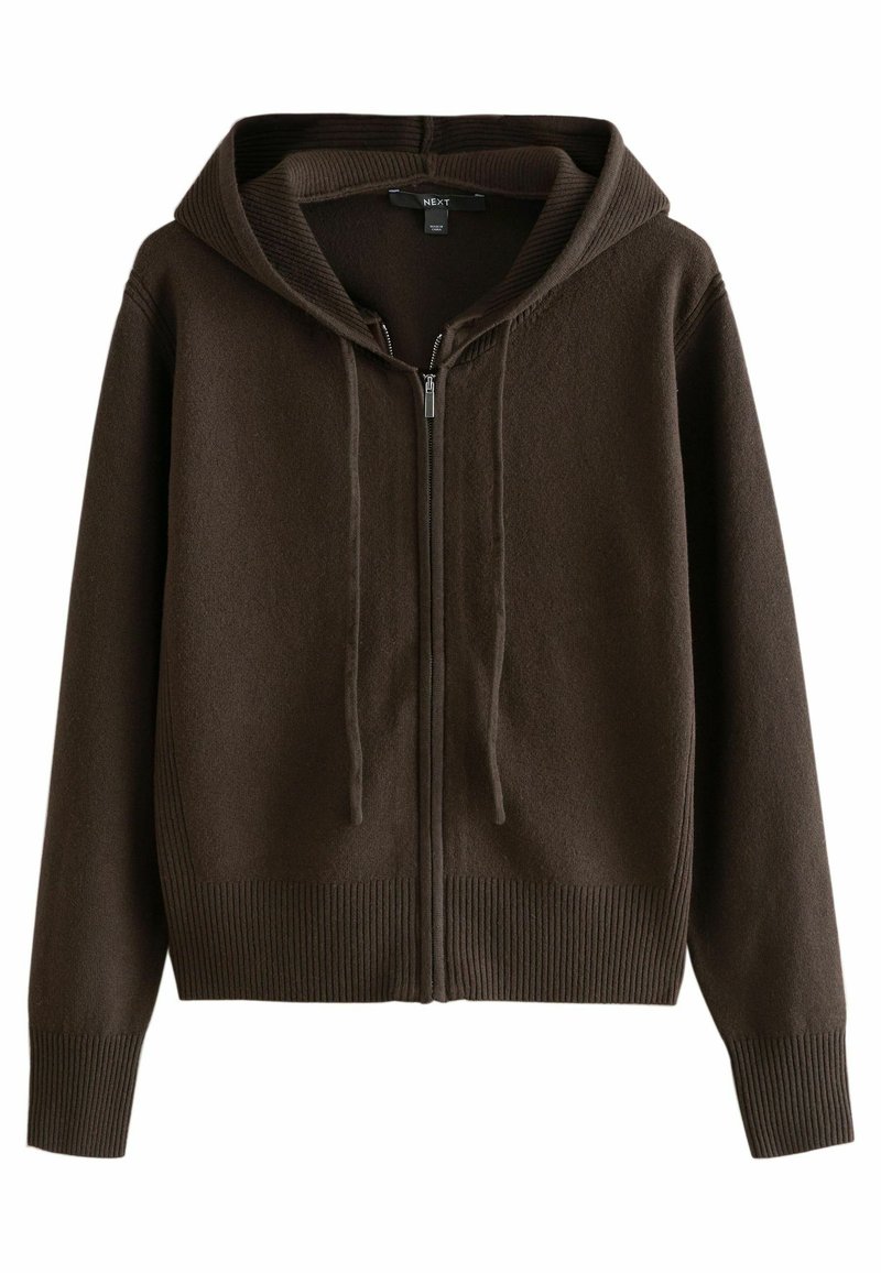 Ruda zip-up gobtuvė, pagaminta iš minkštos tekstūruotos medžiagos. Turi gobtuvą, šonkačius ant rankovių ir apatinio krašto, reguliuojamus raiščius bei priekinės kišenes.