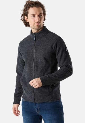 Gray zip-up jacket made of textured fabric with a high collar, front pockets, and logo accent on the left shoulder.