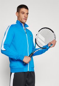 Fila JACKET MANUEL - Trainingsjacke - simply blue/white