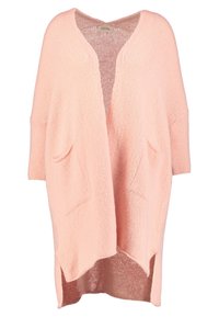Light pink open-front cardigan made of textured yarn, featuring oversized sleeves, two front pockets, and a softly draped silhouette.