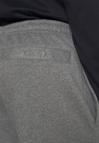 Lacoste Pantaloni sportivi - pitch chine