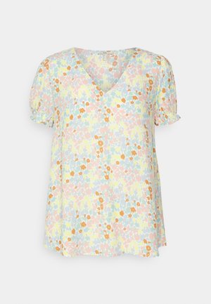 Blouse à manches courtes col en V avec imprimé floral pastel en jaune doux, rose, bleu et orange, avec poignets froncés.