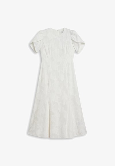 Balta suknelė su gėlėta tekstūra, trumpomis pūkuotomis rankovėmis ir apvaliu iškirpimu. Turi platų sijoną ir paslėptą užtrauktuką nugaroje.