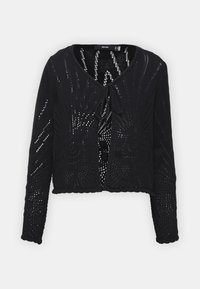 Cardigan corto lavorato a maglia nera con maniche lunghe, dotato di chiusura con fiocco e di un motivo a trame aperte su tutta la stoffa.