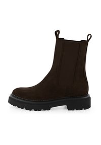 Brauner Chelsea-Stiefel aus Wildleder mit elastischen Seitenteilen, Zuglaschen und einer klobigen schwarzen Gummisohle mit strukturiertem Profil.