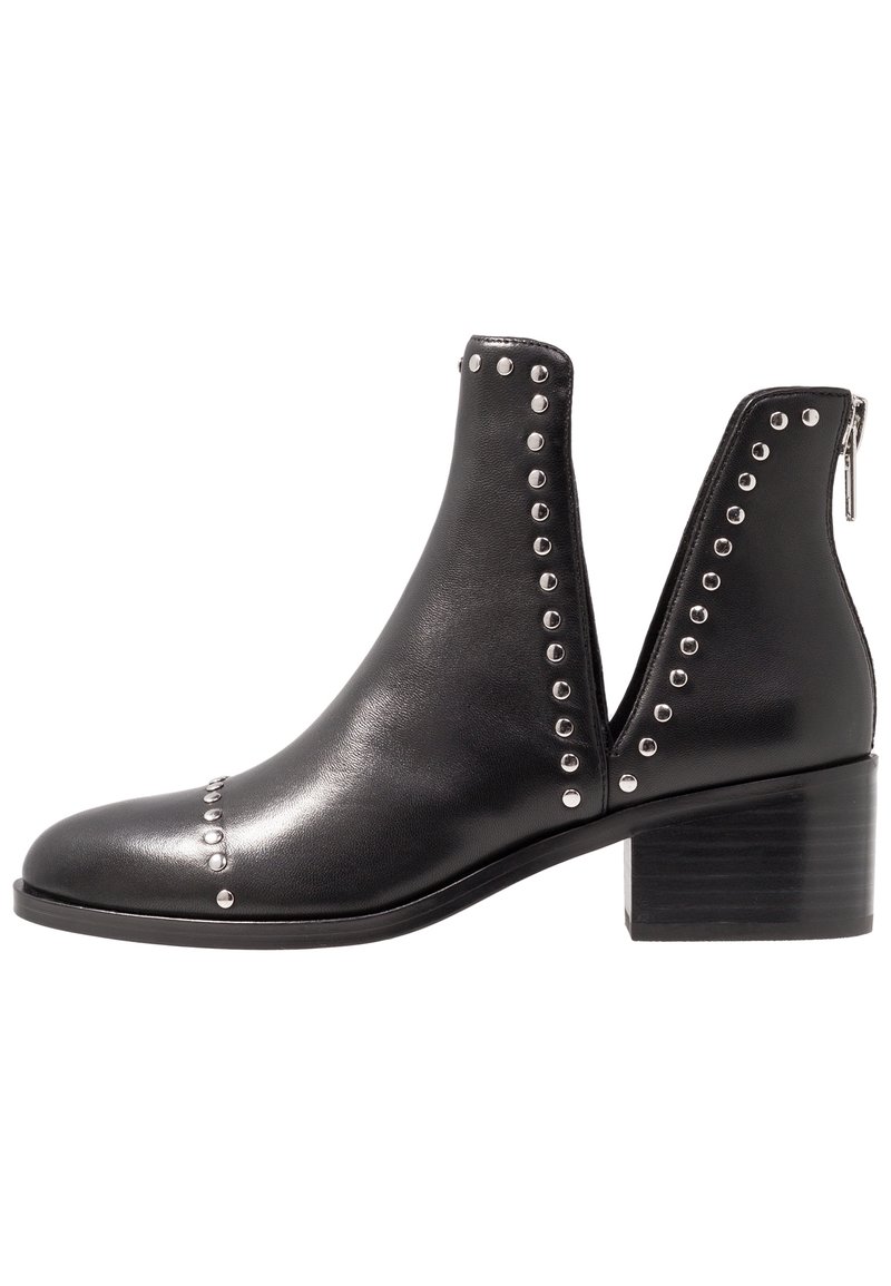 Black leather ankle boots with metal stud detailing, cut-out sides, and a chunky heel. Features a zipper at the back for easy wear.
